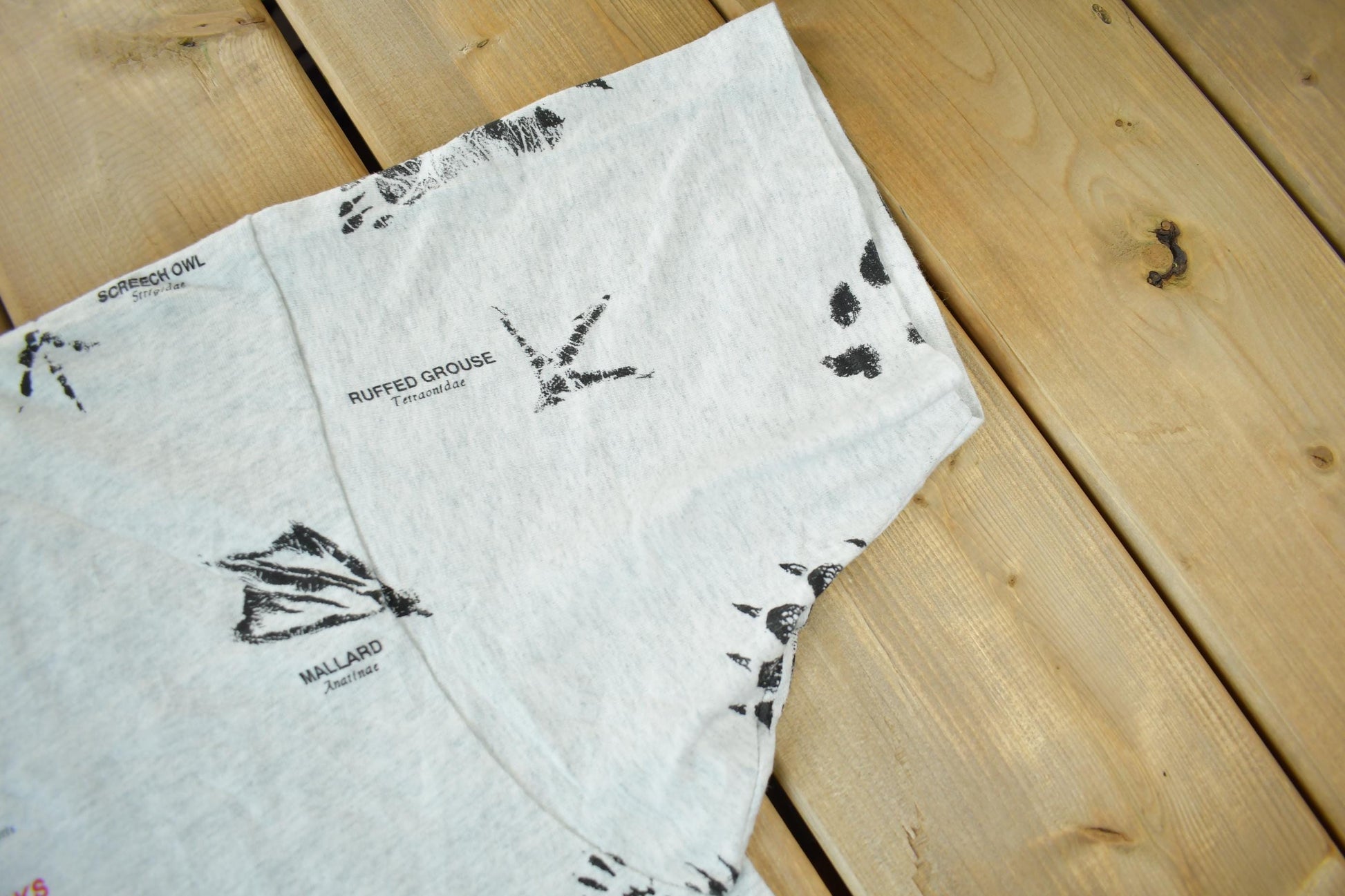 Vintage 1990s Animal Tracks All Over Print Graphic T-Shirt Men's 2XL from propervintagecanada