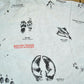 Vintage 1990s Animal Tracks All Over Print Graphic T-Shirt Men's 2XL from propervintagecanada
