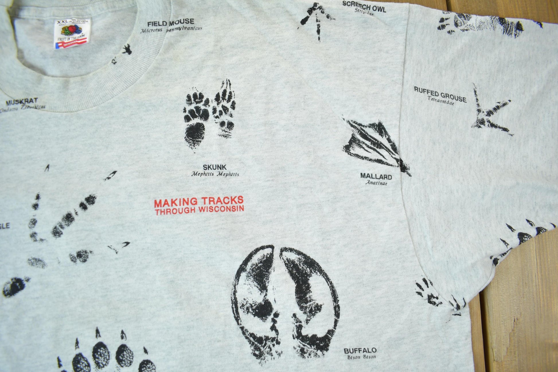 Vintage 1990s Animal Tracks All Over Print Graphic T-Shirt Men's 2XL from propervintagecanada