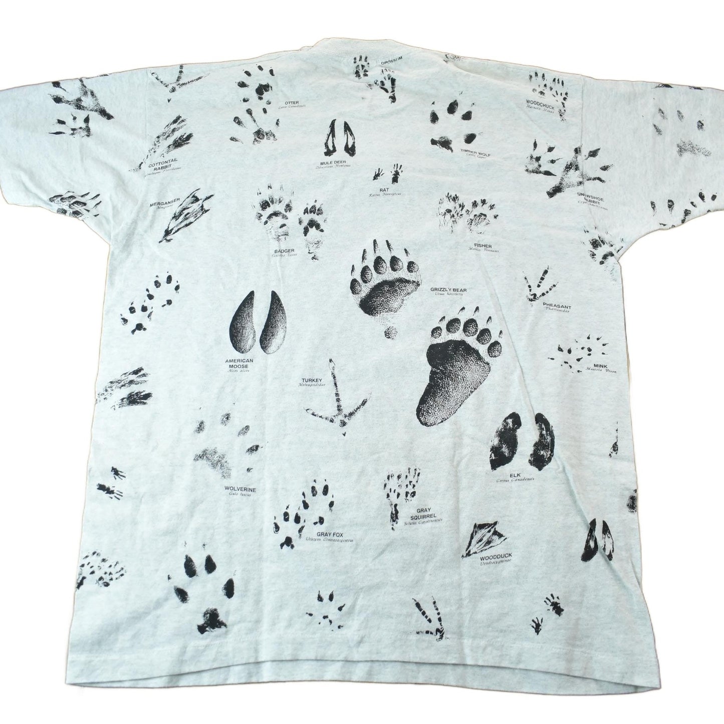 Vintage 1990s Animal Tracks All Over Print Graphic T-Shirt Men's 2XL from propervintagecanada