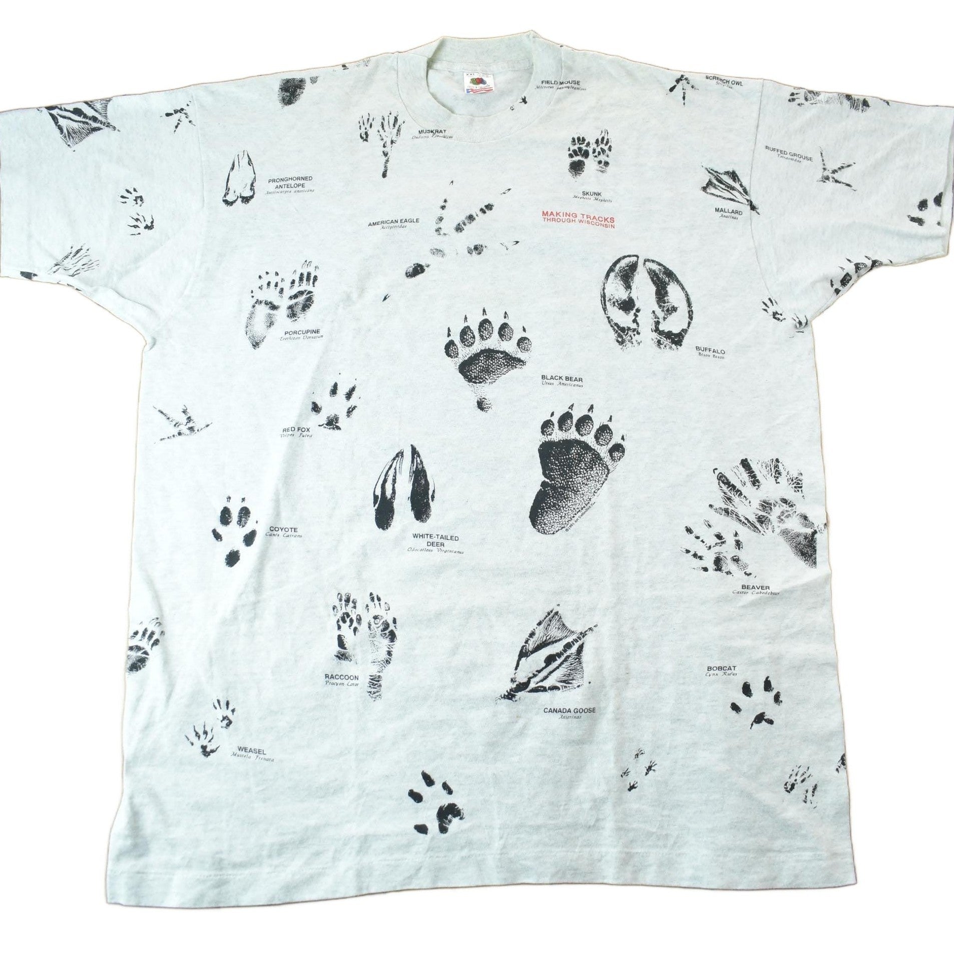 Vintage 1990s Animal Tracks All Over Print Graphic T-Shirt Men's 2XL from propervintagecanada
