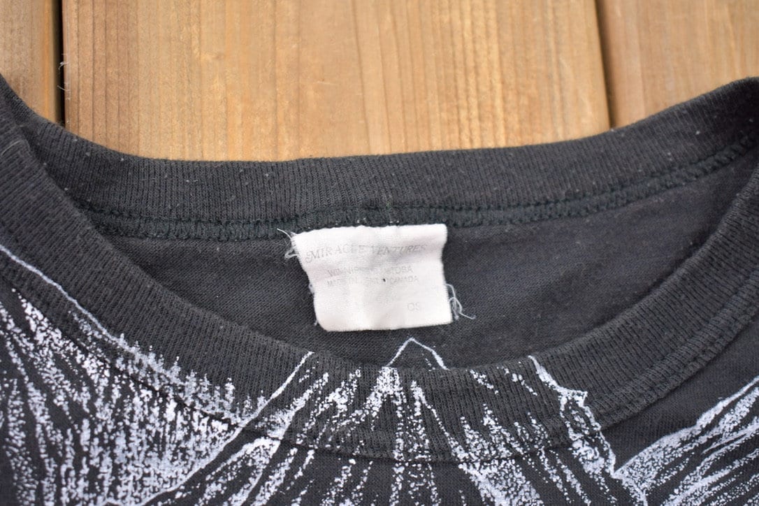 Vintage 1990s Animals All Over Print Graphic T-Shirt Men's Large from propervintagecanada