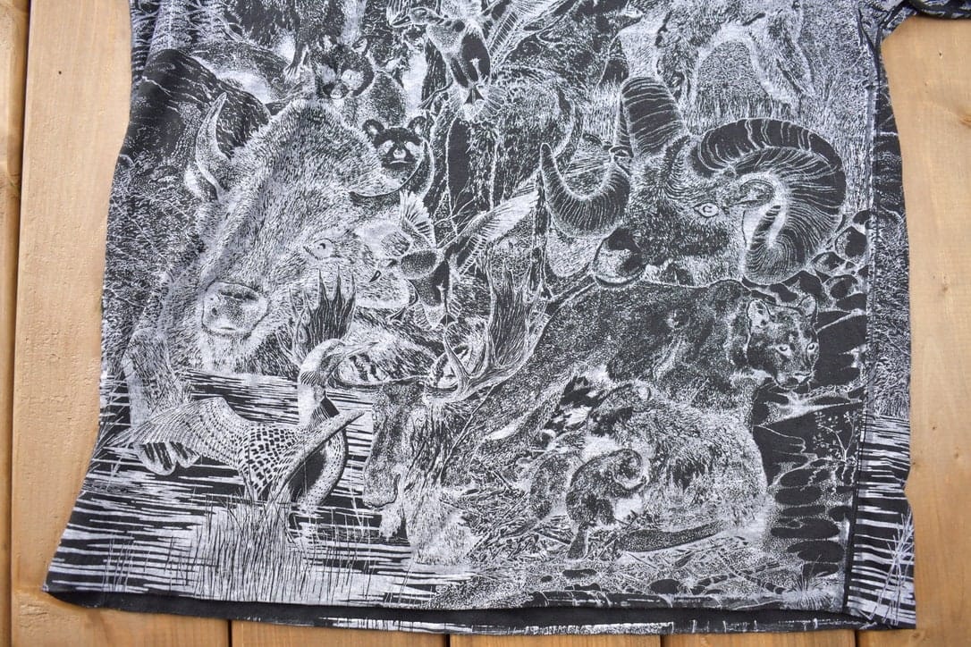 Vintage 1990s Animals All Over Print Graphic T-Shirt Men's Large from propervintagecanada