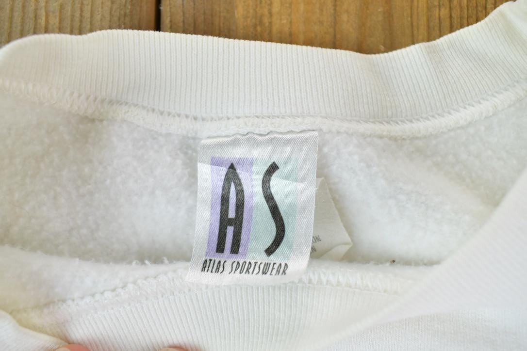 Vintage 1990s Anne Geddes Christmas Crewneck Sweatshirt Made In USA Men's Large from propervintagecanada