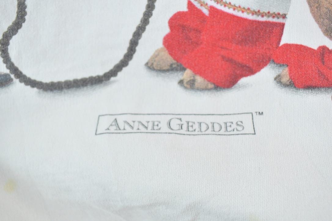 Vintage 1990s Anne Geddes Christmas Crewneck Sweatshirt Made In USA Men's Large from propervintagecanada