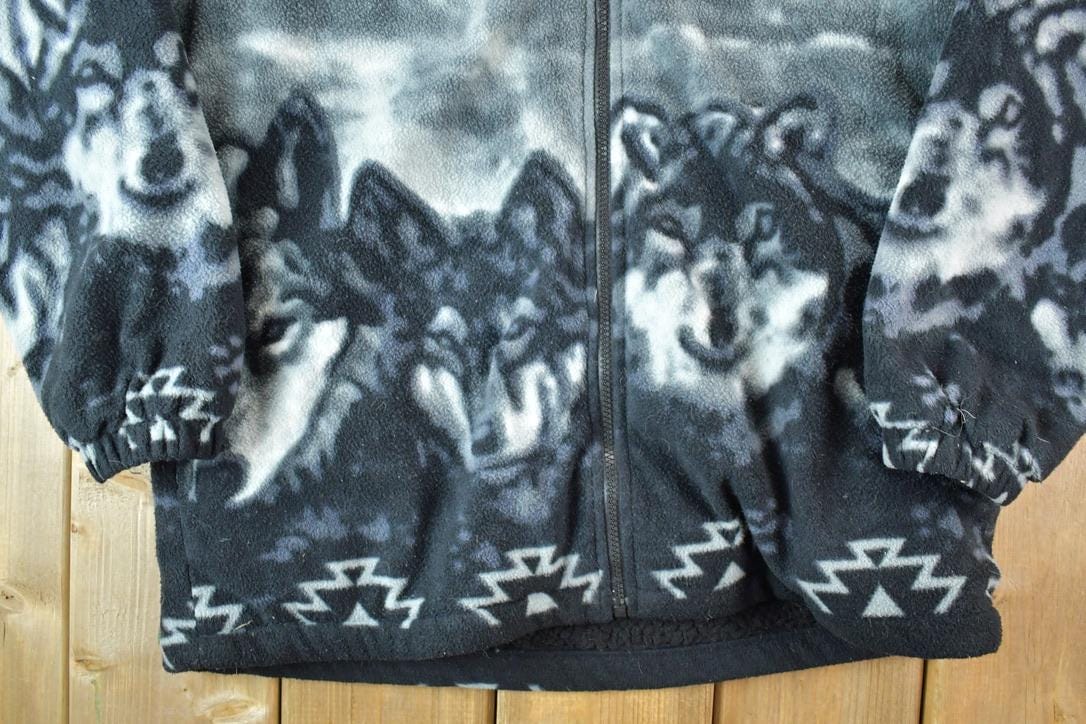 Vintage 1990s AOP Wolves Fleece Outdoorsman Hooded Zip Up Sweater Men's Large from propervintagecanada