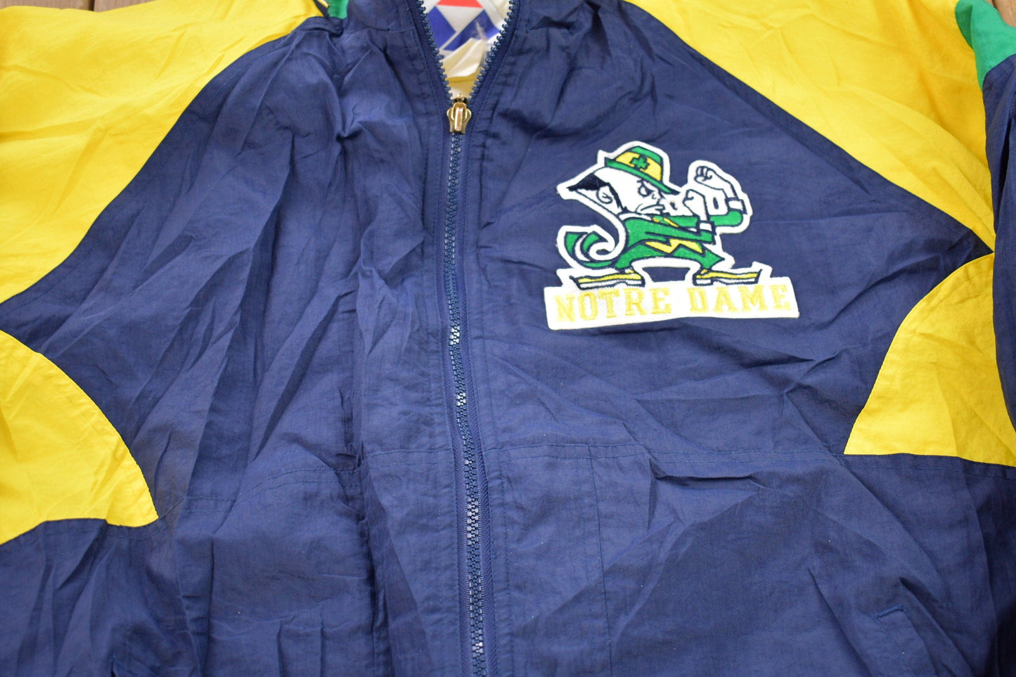 Vintage 1990s Apex One University of Notre Dame Fighting Irish Collegiate Windbreaker Jacket Men's 2XL from propervintagecanada