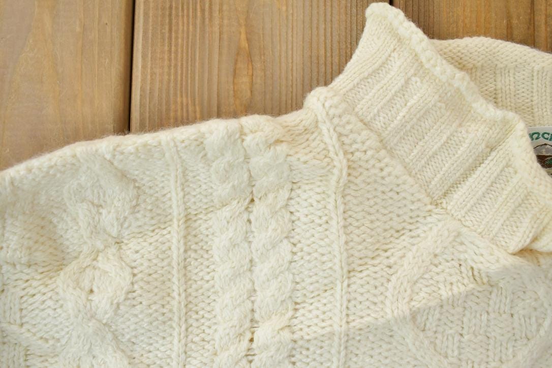 Vintage 1990s Arancrafts 100% Merino Wool Knit Sweater Men's 2XL from propervintagecanada