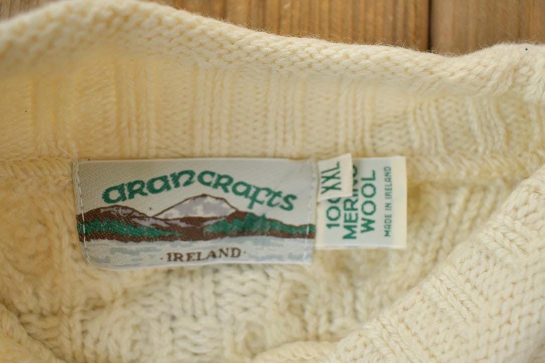 Vintage 1990s Arancrafts 100% Merino Wool Knit Sweater Men's 2XL from propervintagecanada