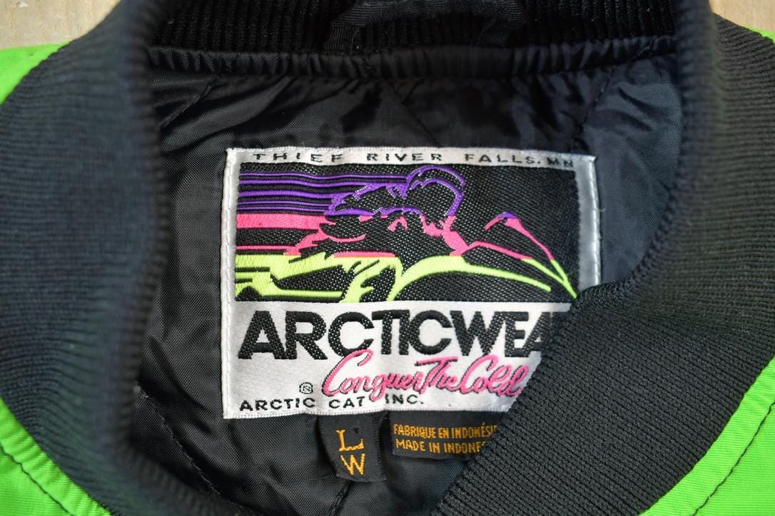 Vintage 1990s Arctic Cat Kids Snowmobile Racing Jacket Youth Large from propervintagecanada