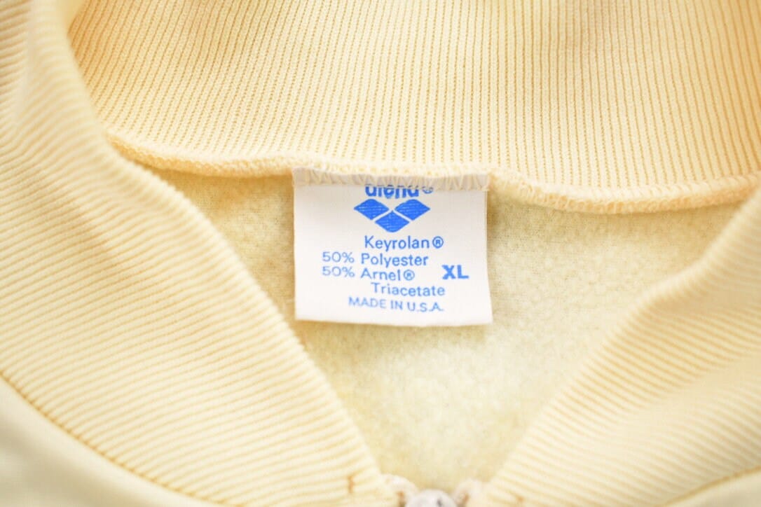 Vintage 1990s Arena Zip Up Track Jacket Men's XL from propervintagecanada