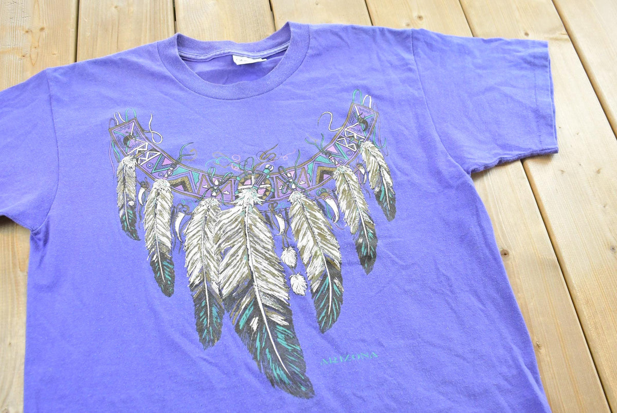 Vintage 1990s Arizona Feather Necklace T-Shirt Men's L from propervintagecanada