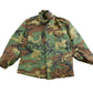 Vintage 1990s Army Woodland Camo Military Field Jacket Men's Large from propervintagecanada