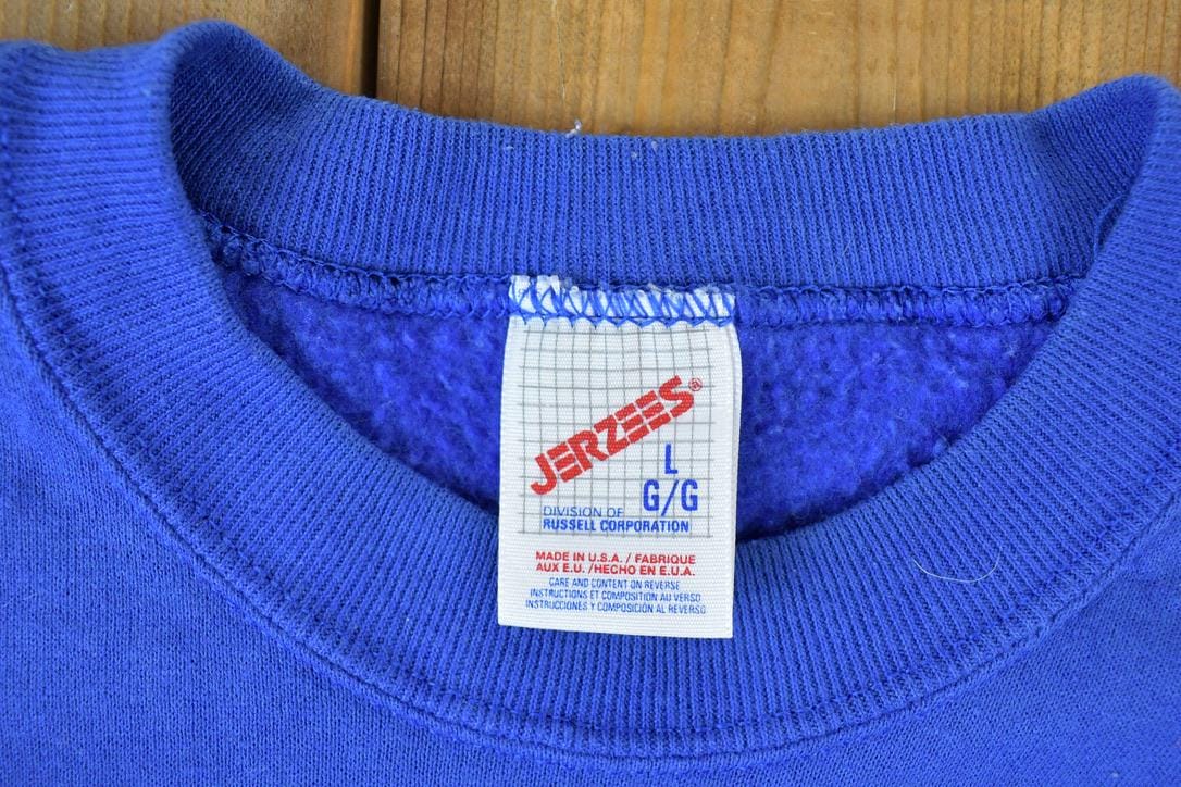 Vintage 1990s Art Wolf Outdoorsman Crewneck Sweatshirt Men's Large from propervintagecanada