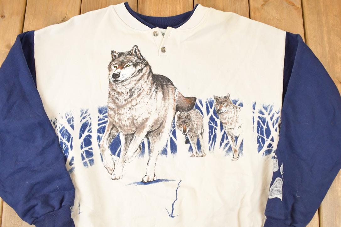 Vintage 1990s Artisans Large Wolf Graphic Print Button Up AOP Crewneck Sweatshirt Mens L from propervintagecanada