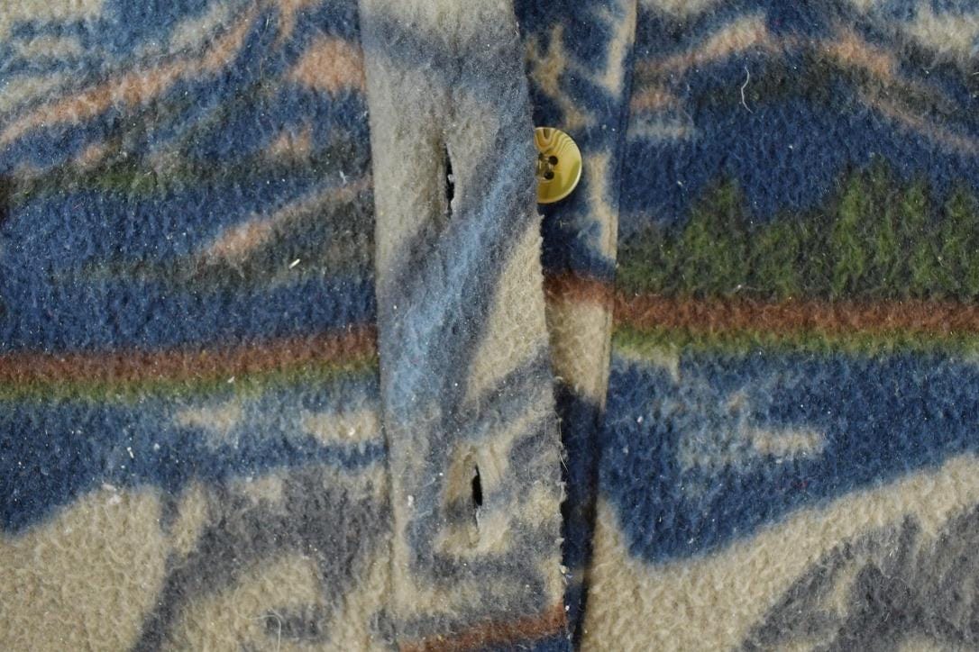 Vintage 1990s Ash Creek Wolves Fleece Sweater Men's XL from propervintagecanada