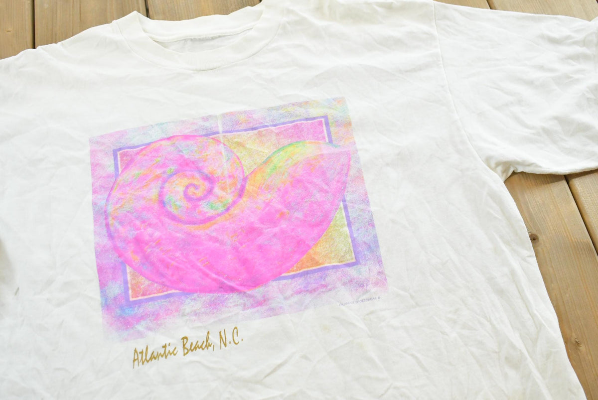 Vintage 1990s Atlantic Beach North Carolina Sea Shell Souvenir Travel T Shirt Made In USA Mens XL from propervintagecanada