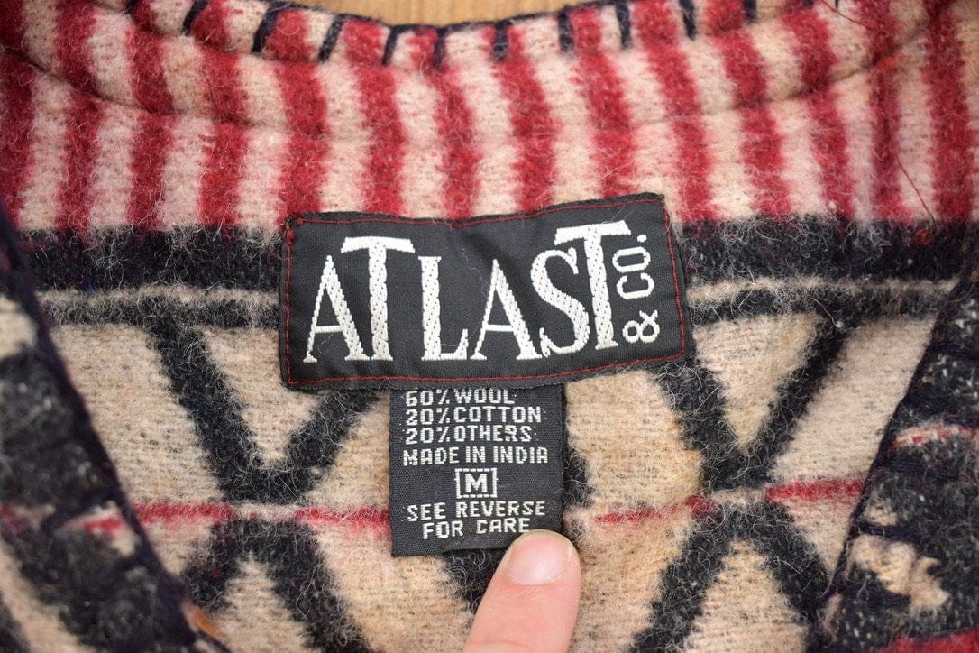 Vintage 1990s AtLast & Co. Wool Knitted Sweater Vest Men's XS from propervintagecanada