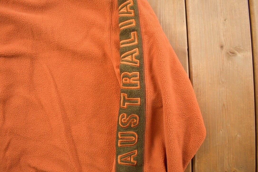 Vintage 1990s Australia Travel Fleece Sweater Men's Large from propervintagecanada
