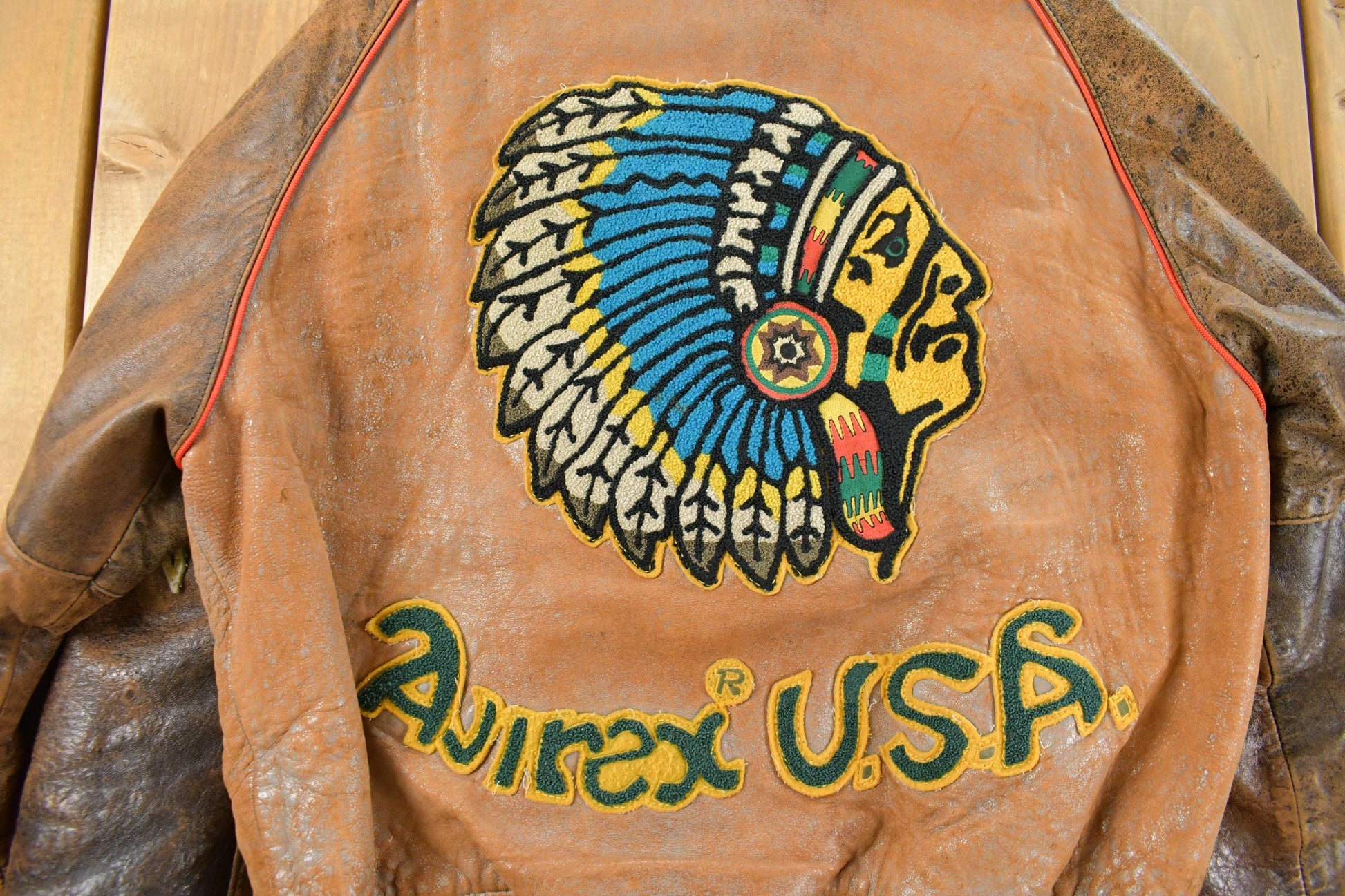 Vintage 1990s Avirex USA Native Tribal Leather Varsity Jacket Men's Medium from propervintagecanada