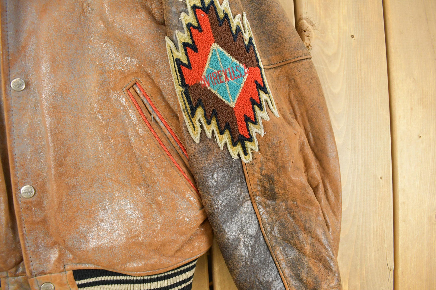 Vintage 1990s Avirex USA Native Tribal Leather Varsity Jacket Men's Medium from propervintagecanada