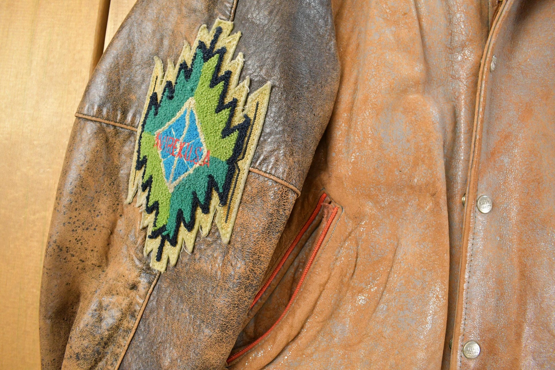 Vintage 1990s Avirex USA Native Tribal Leather Varsity Jacket Men's Medium from propervintagecanada