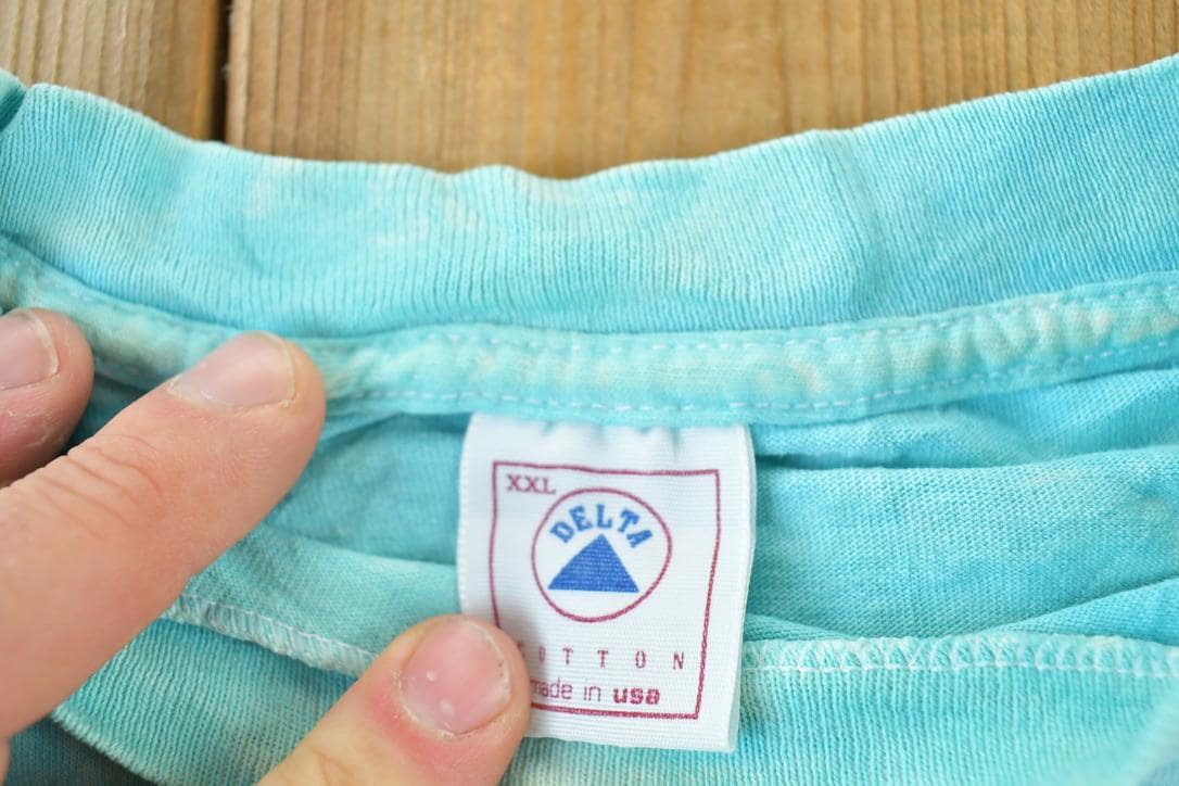 Vintage 1990s Aztec Souvenir Feather Single Stitch Graphic Print T-Shirt Men's Large from propervintagecanada