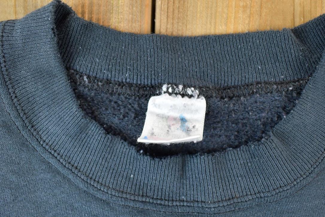 Vintage 1990s Aztec Wolf Outdoorsman Crewneck Sweatshirt Men's Large from propervintagecanada