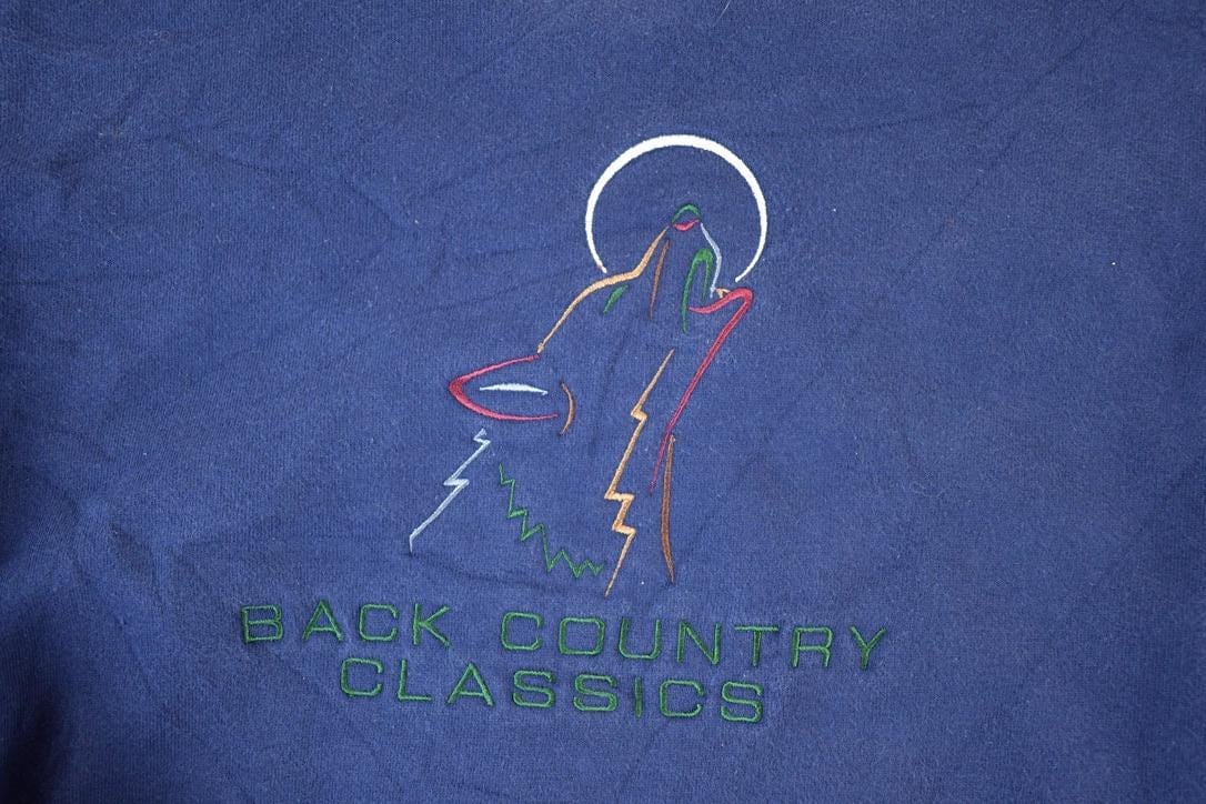 Vintage 1990s Back Country Classics Embroidered Wolf Crewneck Sweatshirt Mens M from propervintagecanada