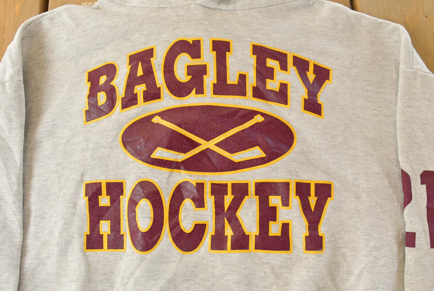 Vintage 1990s Bagley Hockey Hoodie Sweatshirt Men's XL from propervintagecanada
