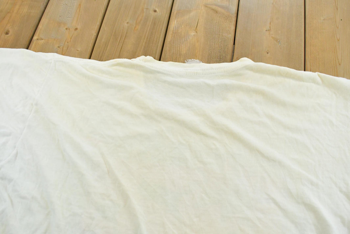 Vintage 1990s Baha Catch Some Rays T-Shirt Mens XL from propervintagecanada