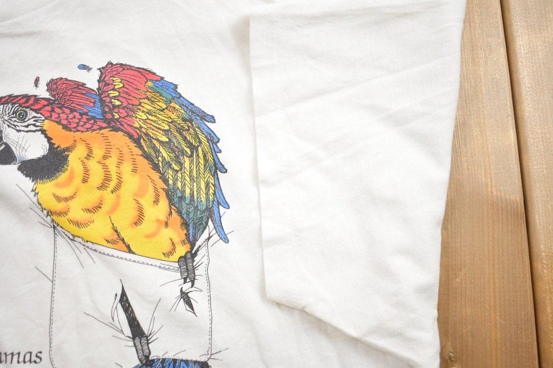 Vintage 1990s Bahamas Parrot Bird Theme Graphic T-Shirt Men's 2XL from propervintagecanada