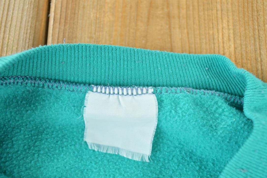 Vintage 1990s Bear Bobcat Outdoorsman Crewneck Sweatshirt Men's Large from propervintagecanada