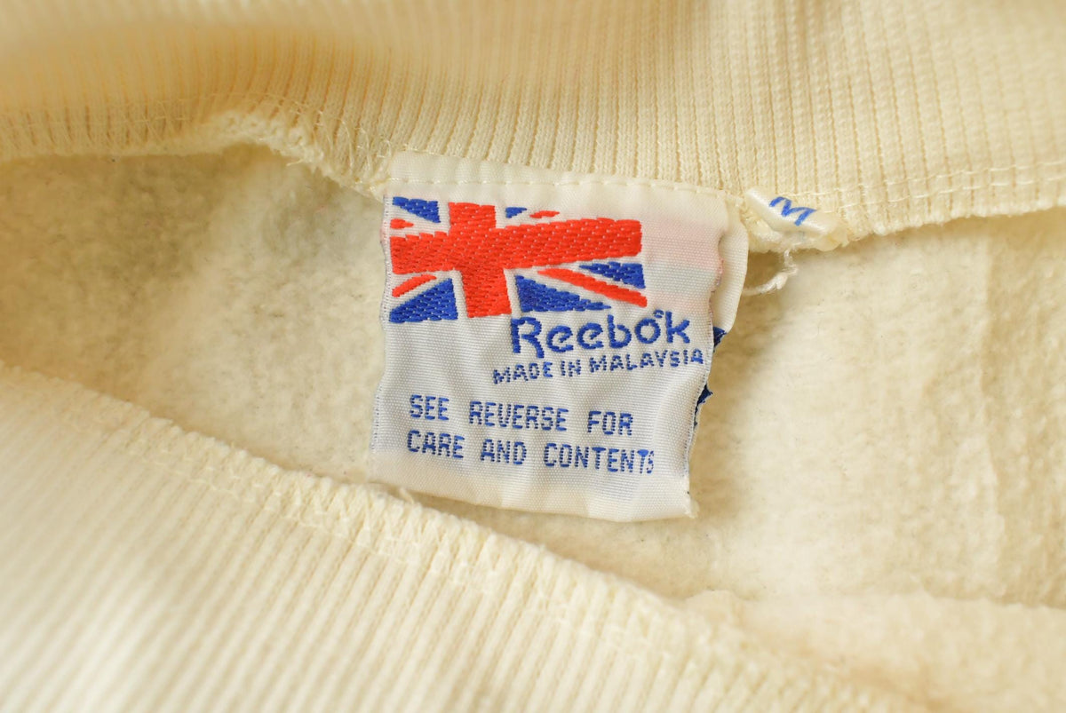 Vintage 1990s Beige Embroidered Reebok Shoulder Mini Logo Crewneck Sweatshirt Men's S from propervintagecanada