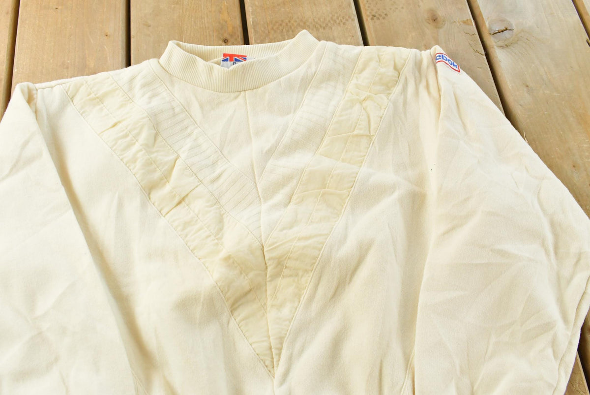 Vintage 1990s Beige Embroidered Reebok Shoulder Mini Logo Crewneck Sweatshirt Men's S from propervintagecanada