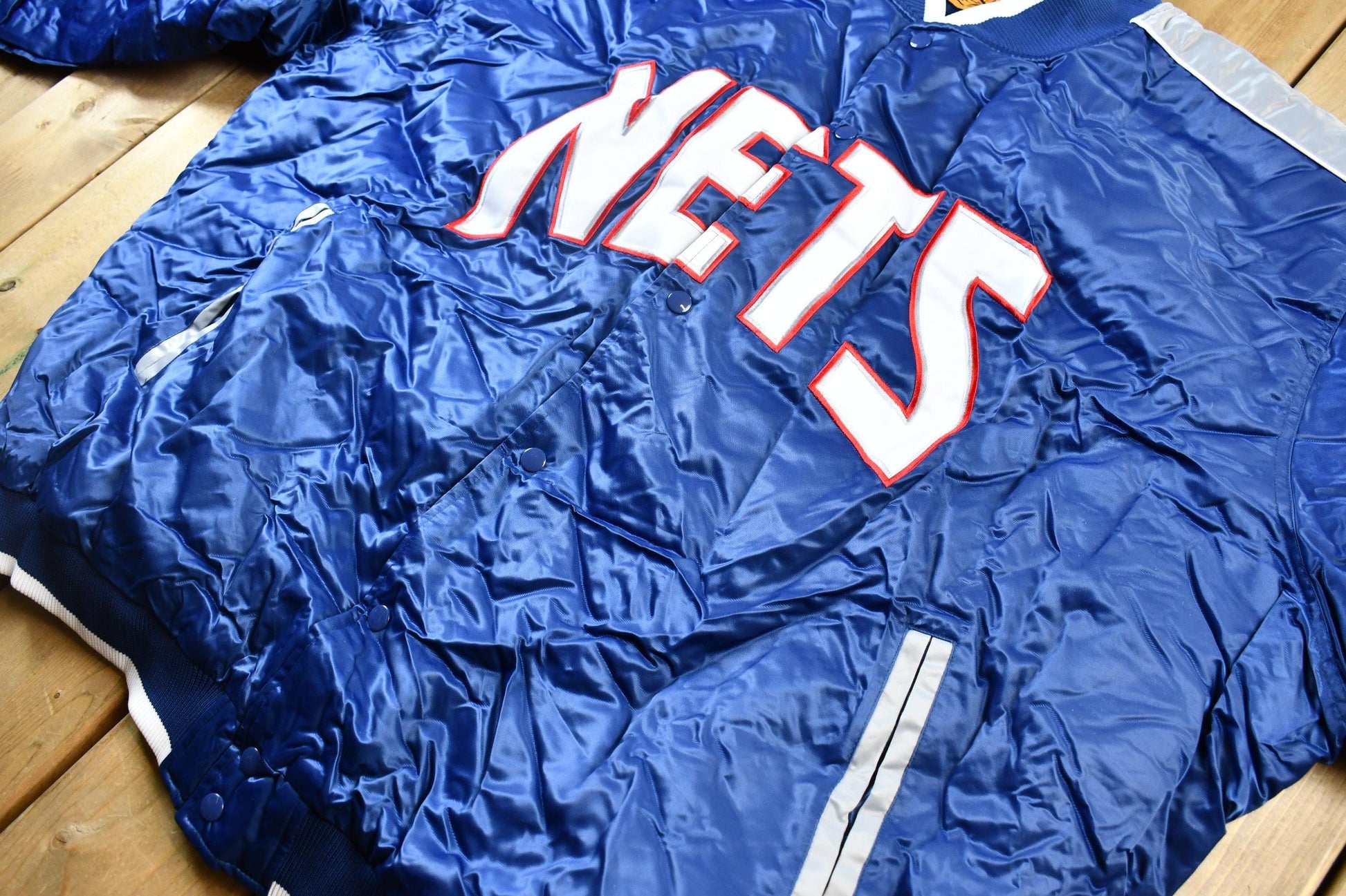 Vintage 1990s Bigman Sports New Jersey Nets NBA Basketball Embroidered Snap Button Satin Bomber Jacket Men's 4XL from propervintagecanada