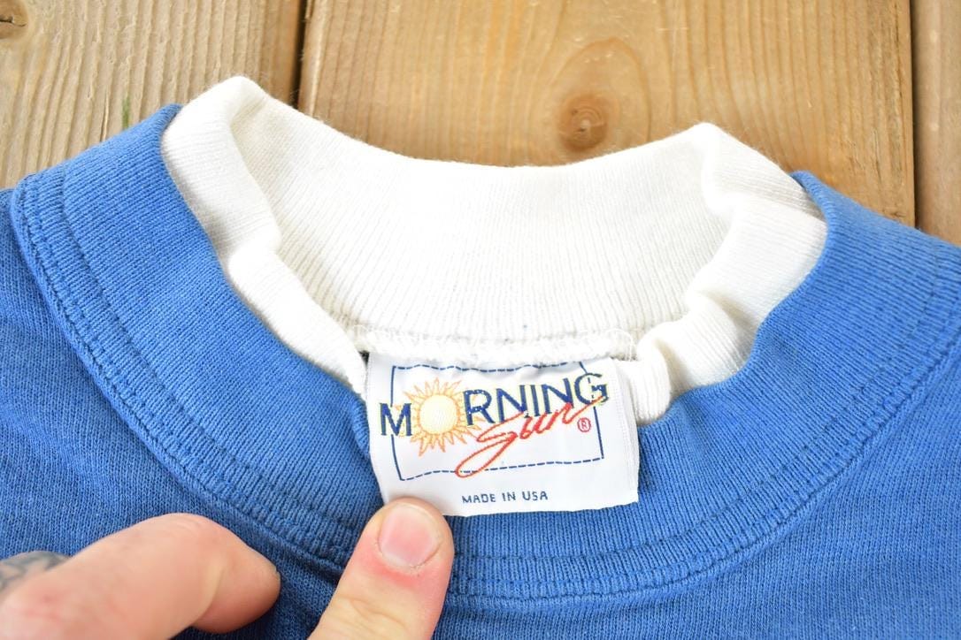 Vintage 1990s Bird Neighbourhood Double Collar Morning Sun Souvenir Crewneck Sweatshirt Made In USA Men's Large from propervintagecanada