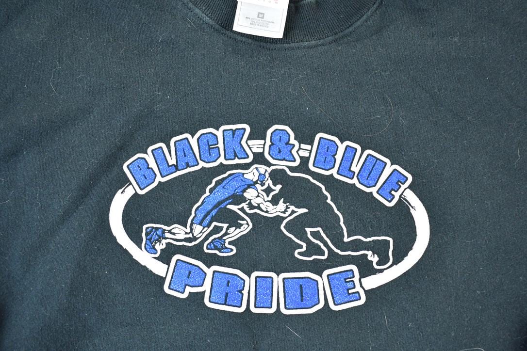 Vintage 1990s Black And Blue Pride Souvenir Football Crewneck Sweatshirt Made In USA Men's Medium from propervintagecanada