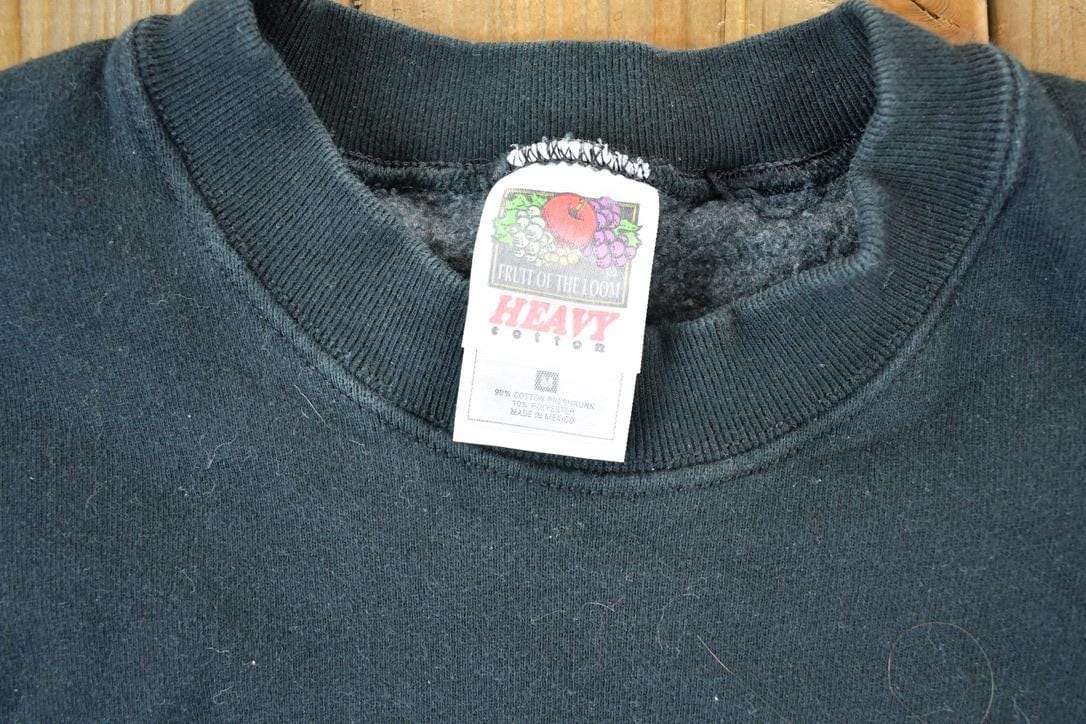 Vintage 1990s Black And Blue Pride Souvenir Football Crewneck Sweatshirt Made In USA Men's Medium from propervintagecanada