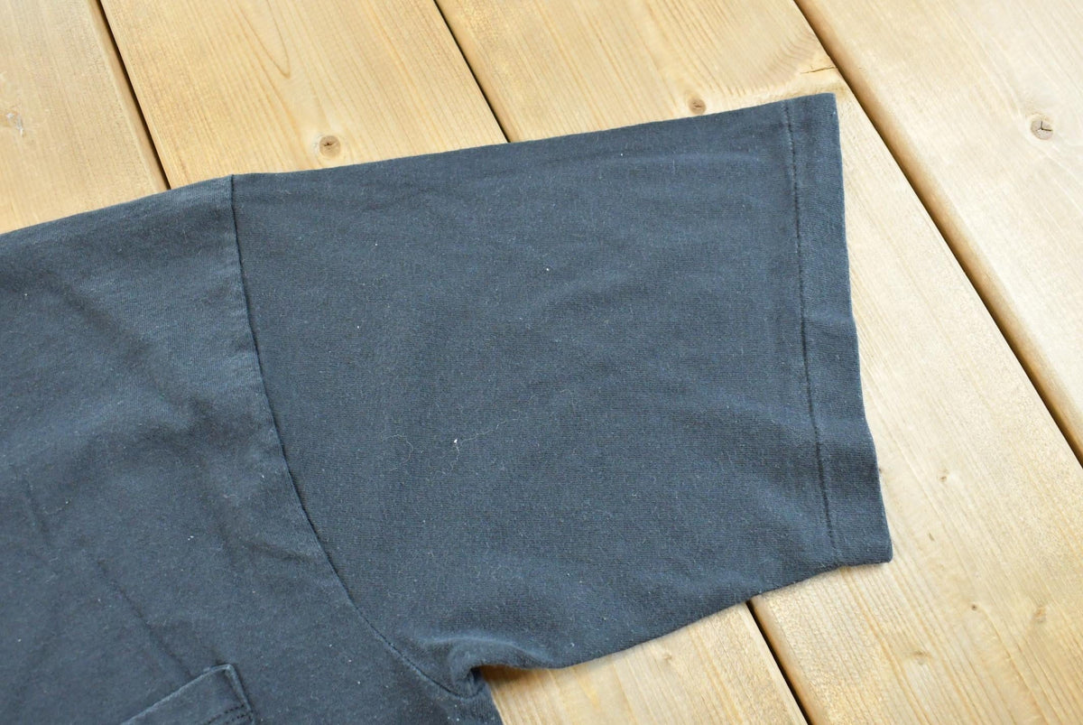 Vintage 1990s Black Blank Pocket T-Shirt Men's L from propervintagecanada