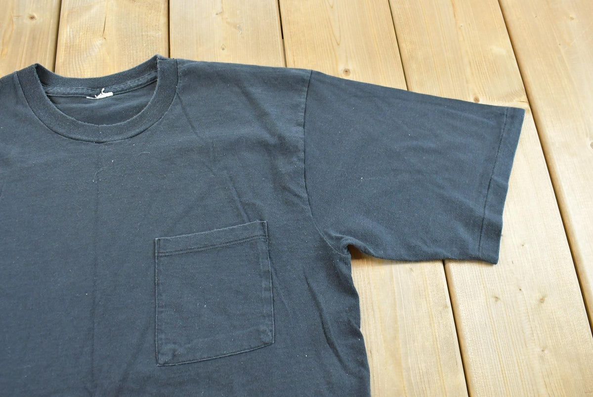 Vintage 1990s Black Blank Pocket T-Shirt Men's L from propervintagecanada