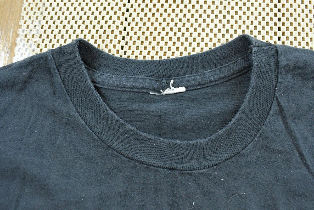 Vintage 1990s Black Blank Pocket T-Shirt Men's L from propervintagecanada