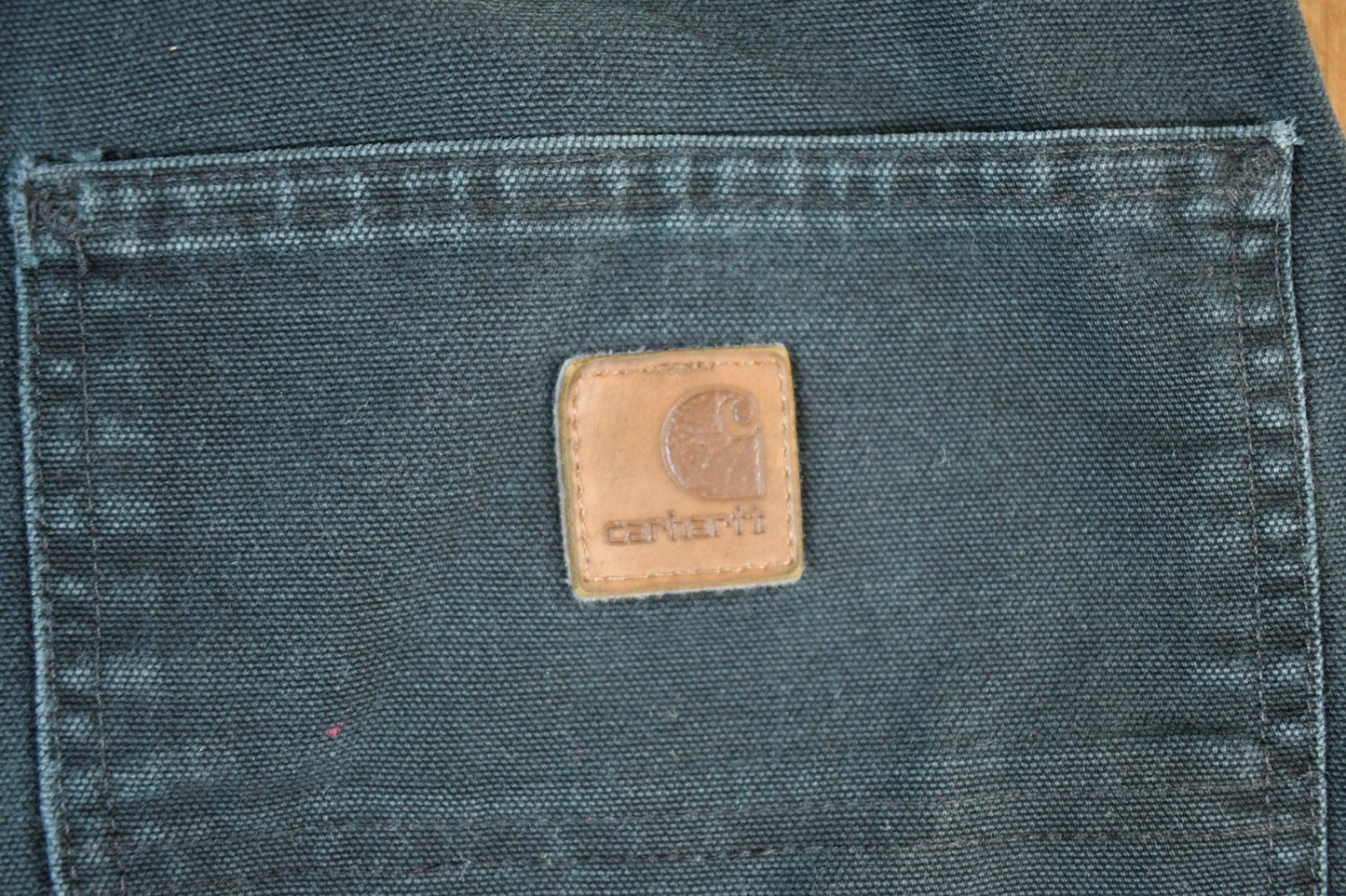 Vintage 1990s Black Carhartt Denim Work Jeans Men's 38 x 32 from propervintagecanada