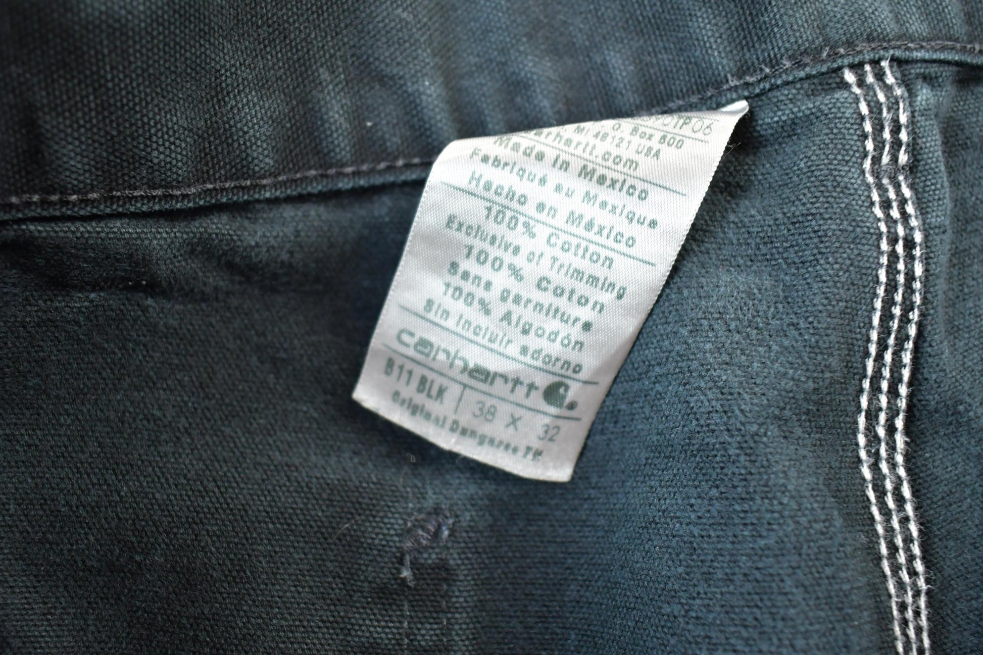 Vintage 1990s Black Carhartt Denim Work Jeans Men's 38 x 32 from propervintagecanada