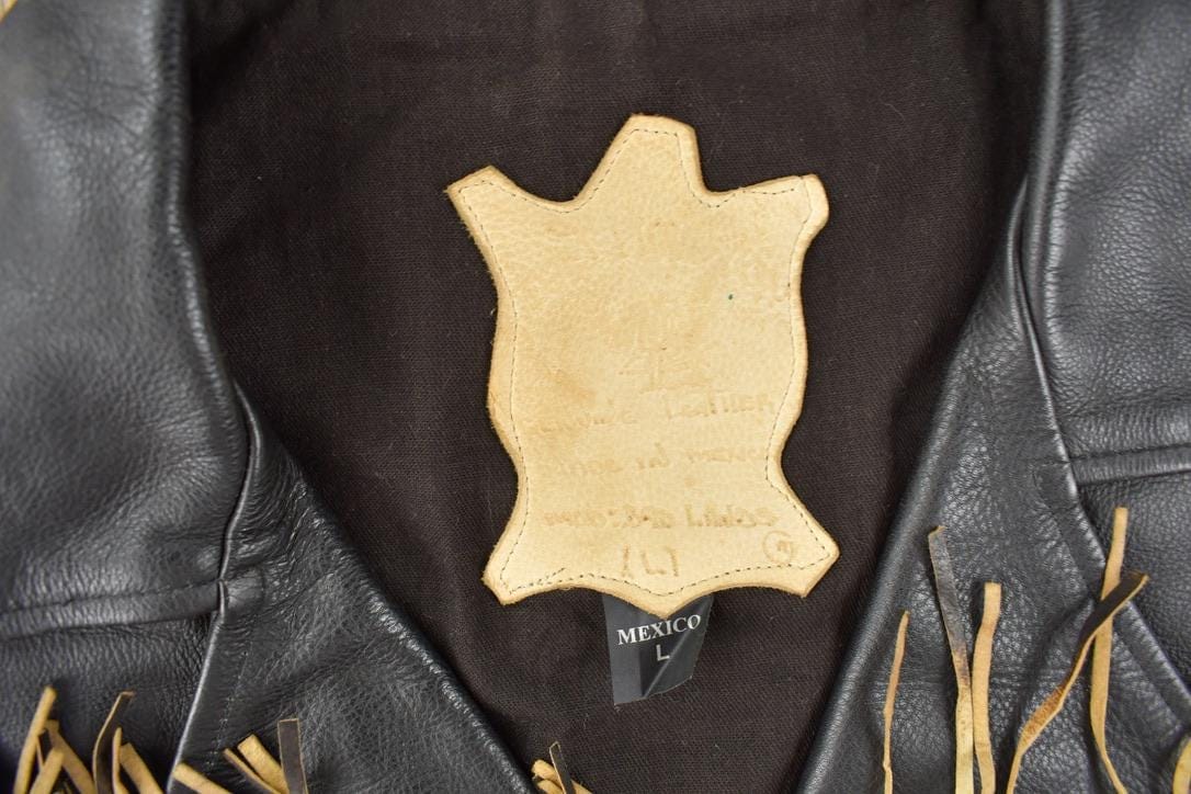 Vintage 1990s Black Leather Fringe Jacket Men's Large from propervintagecanada