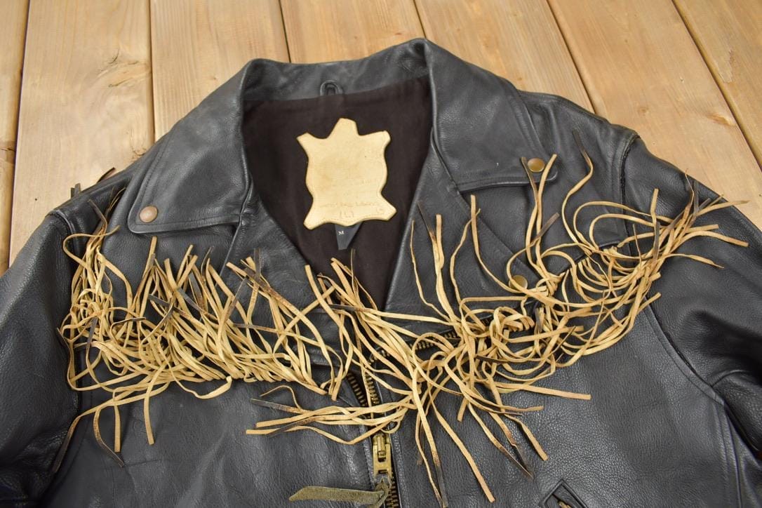 Vintage 1990s Black Leather Fringe Jacket Men's Large from propervintagecanada
