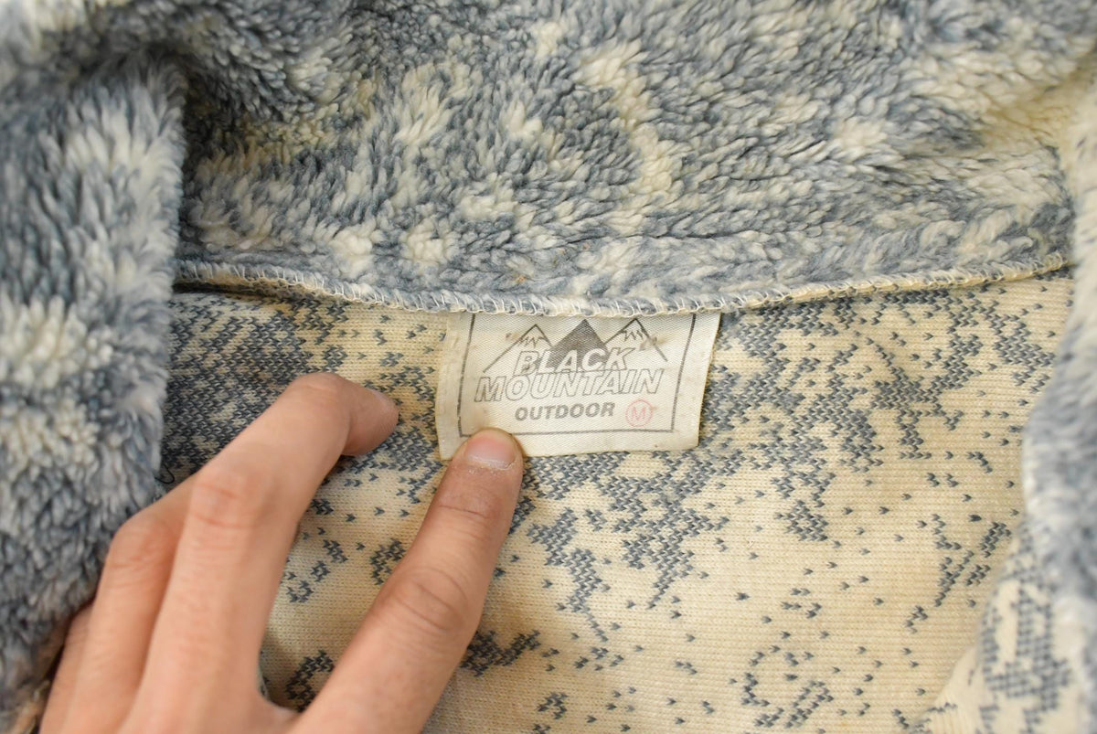 Vintage 1990s Black Mountain Wolf Theme All Over Print Zip Up Fleece Sweater Men's M from propervintagecanada