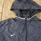 Vintage 1990s Black Nike Mini Swoosh Women's Windbreaker Jacket Size M from propervintagecanada
