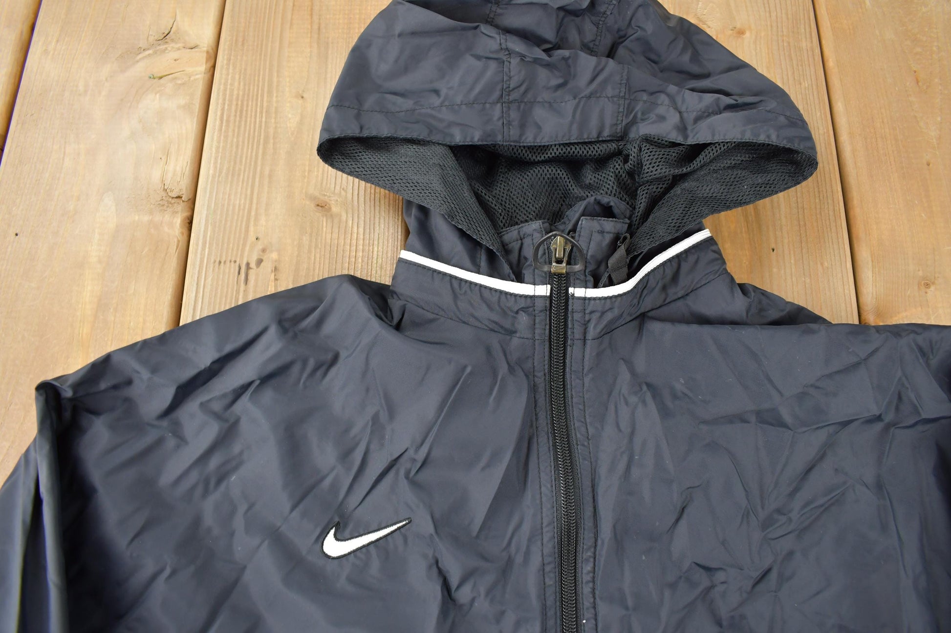 Vintage 1990s Black Nike Mini Swoosh Women's Windbreaker Jacket Size M from propervintagecanada