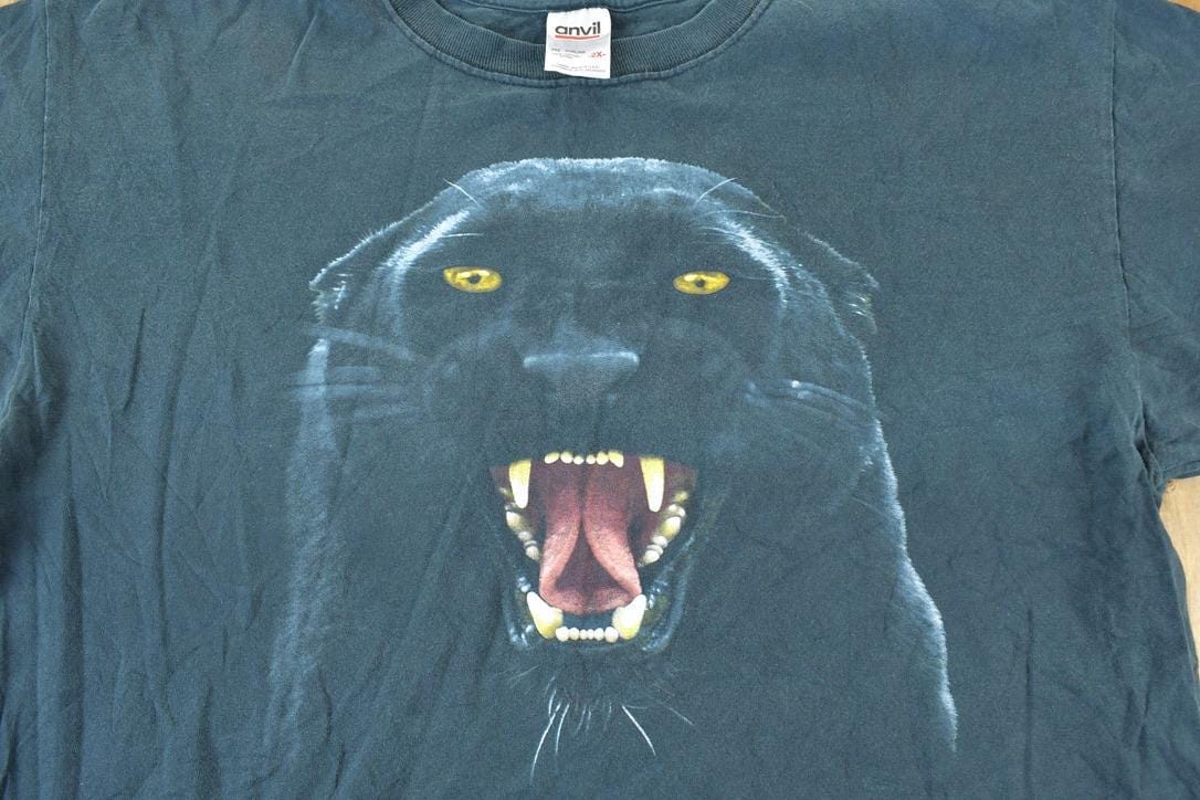 Vintage 1990s Black Panther Outdoors T-Shirt Men's XL from propervintagecanada